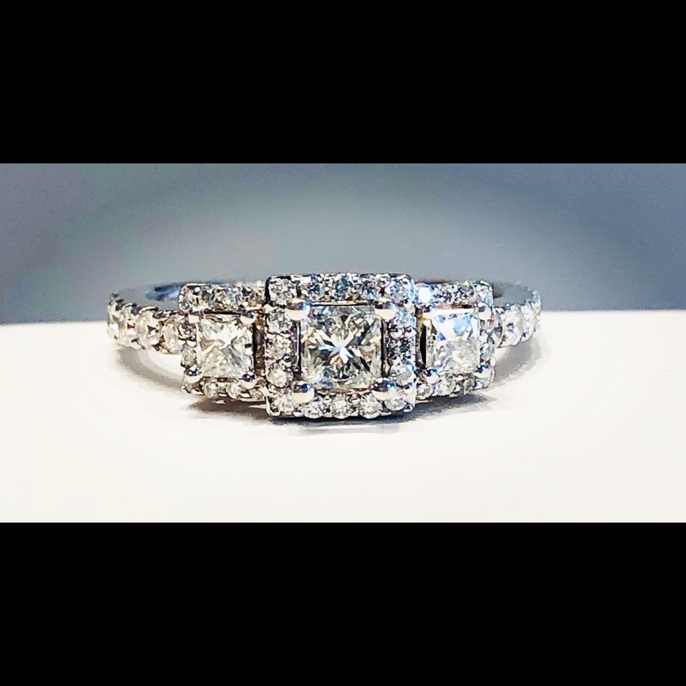 1 cttw Princess cut diamond halo 3 stone ring.